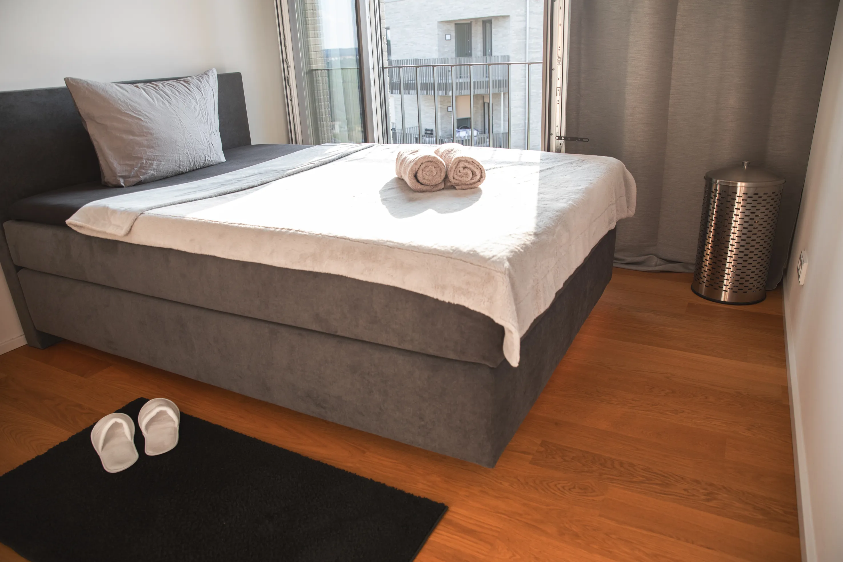 Master bedroom with box spring bed